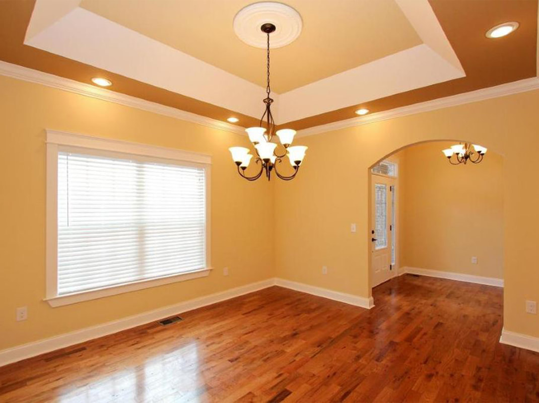 Dining Area with Hard Wood Flooring and Recessed Ceiling