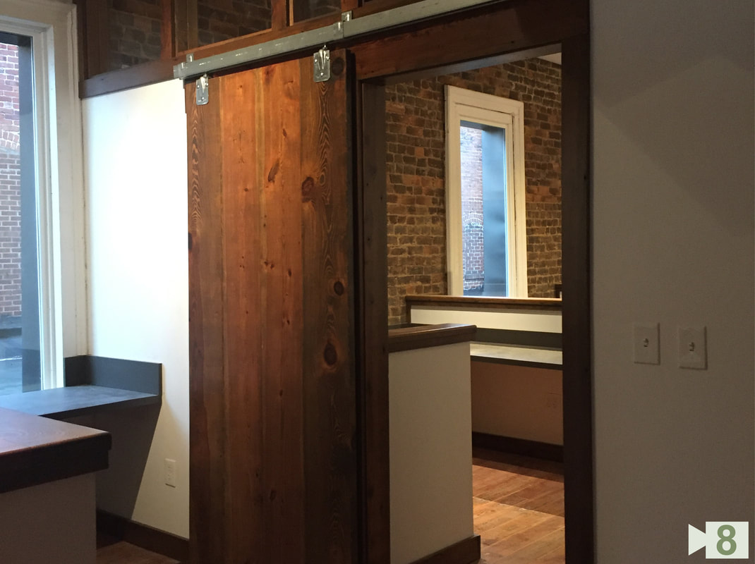 Finished Work Space Entry with Sliding Barn Door